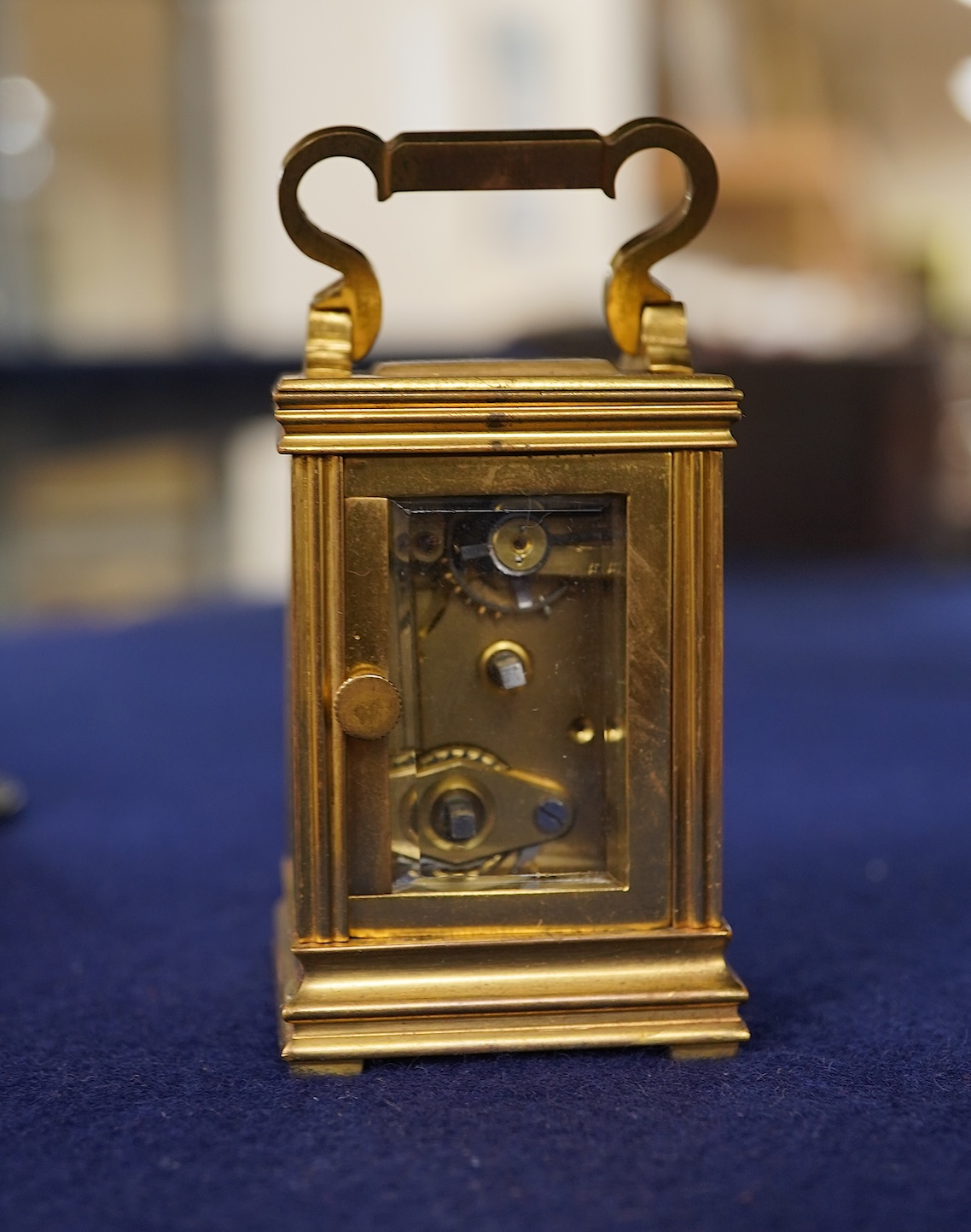 A miniature cased carriage timepiece, with key, 8.5cm high
